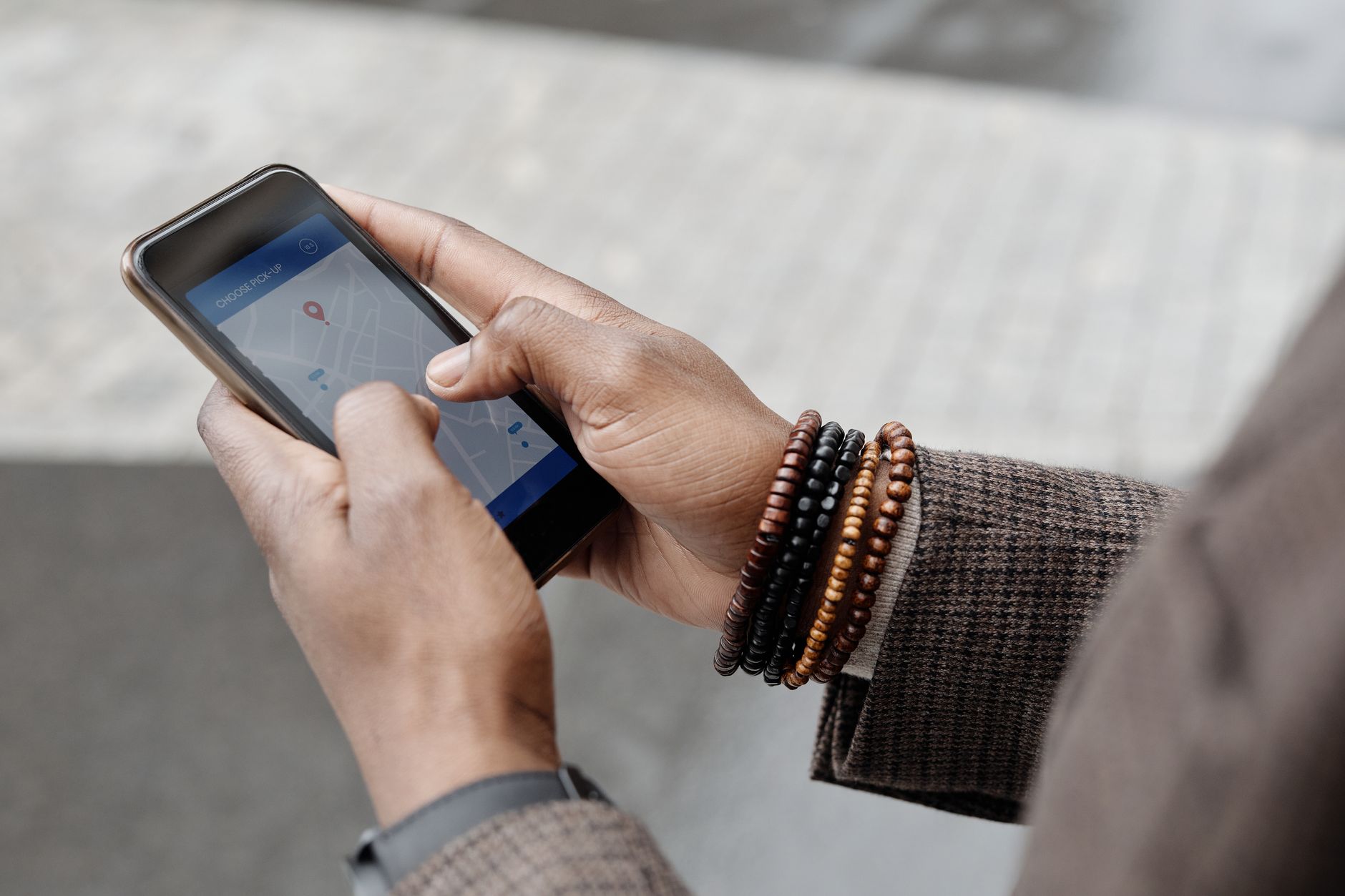 Person checking a local business listing on a smartphone map app
